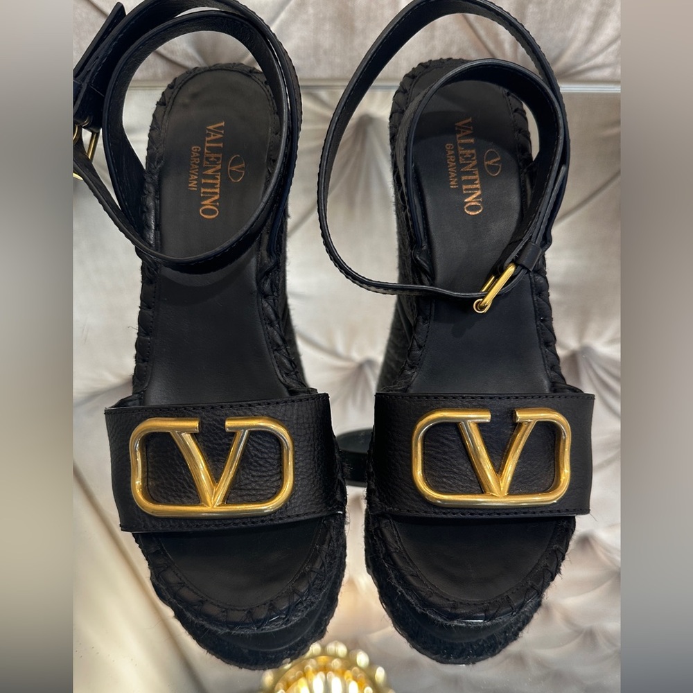 Valentino Garavani black scrappy sandal wedges with a gold V!